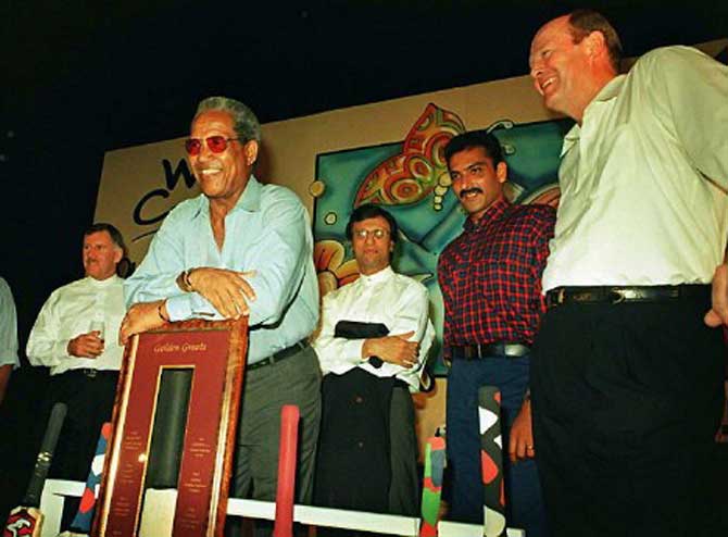 Cricketing greats Ian Chappell (far left), Sir Gary Sobers (leaning on placque),Asif Iqbal (centre back),Ravi Shastri (2nd right) and Tony Greig at a cricket memorabila auction in a hotel in south Bombay. The proceeds of the auction, which fetched US$1857 for the memorabilia and US$3571 for a signed bat, went to the Akanksha foundation which works for the street and slum children in Bombay in May 1997.