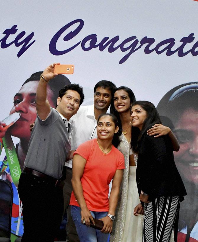  Sachin Tendulkar taking selfie with Rio Olympics silver medalist shuttler P V Sindhu, bronze winner grappler Sakshi Malik, gymnast Dipa Karmakar and Pullela Gopichand