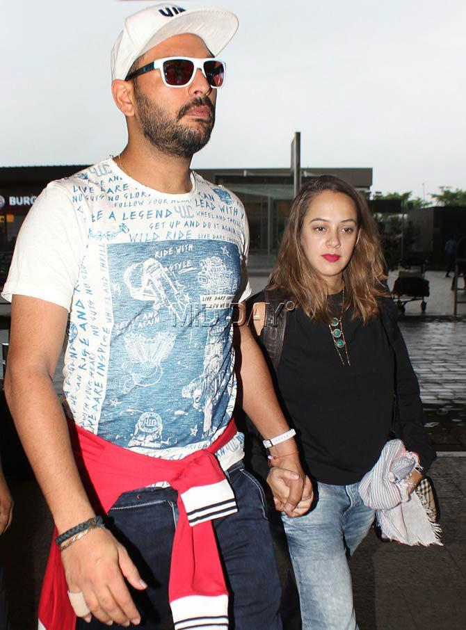 Yuvraj Singh and wife Hazel Keech were recently snapped at the Mumbai airport by photographers. Pics/Yogen Shah