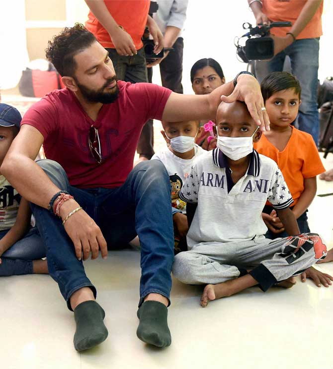 Star cricketer Yuvraj Singh brought happiness and smiles on the faces of cancer-affected children when he visited the St. Jude India ChildCare centre in Mumbai on Friday ahead of Christmas. Pic/PTi Star cricketer Yuvraj Singh brought happiness and smiles on the faces of cancer-affected children when he visited the St. Jude India ChildCare centre in Mumbai on Friday ahead of Christmas. Pic/PTi