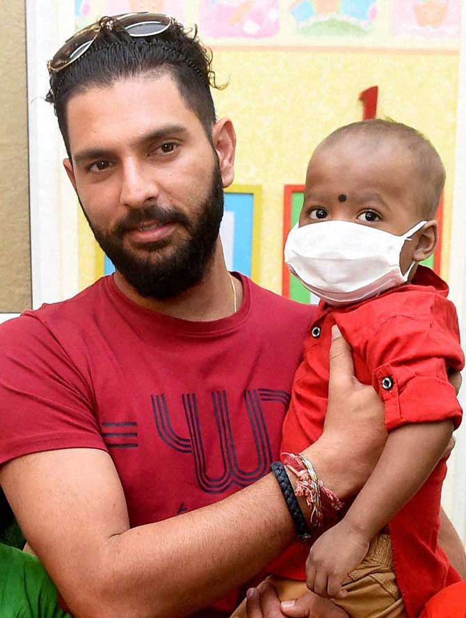 The left-handed cricketer spent quality time with the children in an interactive session followed by special gifts from his fashion label YWC. The left-handed cricketer spent quality time with the children in an interactive session followed by special gifts from his fashion label YWC.
