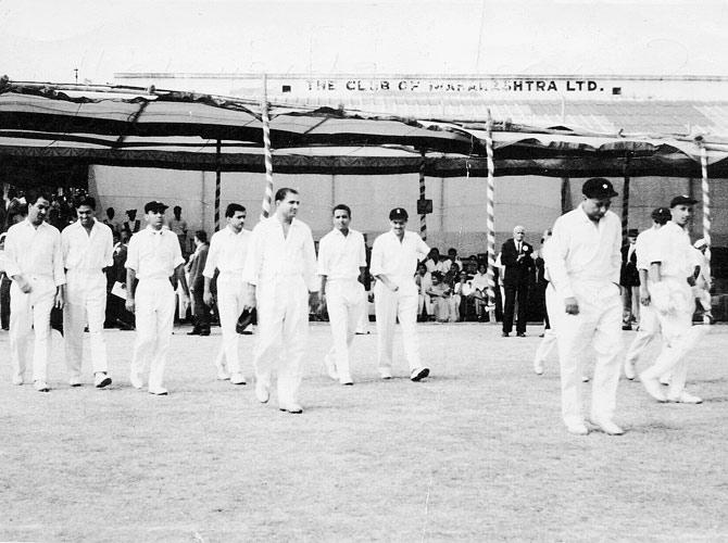 In picture: Vinoo Mankad walking in front of his Maharashtra Governor's XI team vs Maharashtra Chief Minister's XI in a Defence Fund tie at Club of Maharashtra in Pune on Dec 21, 1963. To Mankad's far left is Nari Contractor