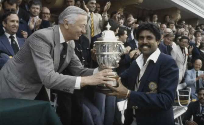 Kapil Dev, Indian cricket captain, receives the Prudential World Cup Trophy after India's victory over the West Indies in the World Cup Final at Lord's cricket ground in London, 25th June 1983. India won by 43 runs.