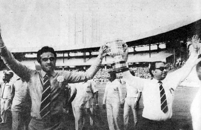 Yashpal Sharma and PR Man Singh, manager of the Indian team, hold aloft the Prudential World Cup at the Wankhede Stadium