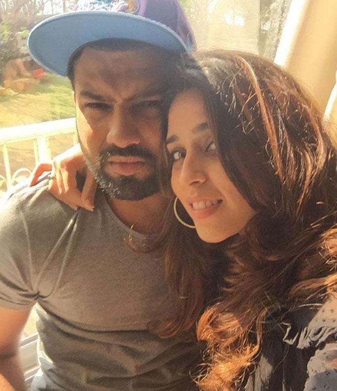In picture: Ritika Sajdeh can't stop smiling but wonder what's holding Rohit Sharma back