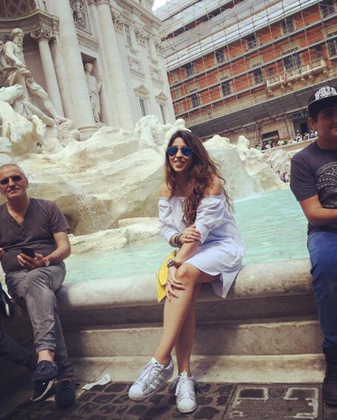 In picture: Ritika Sajdeh poses solo for a photo at Trevi Fountain