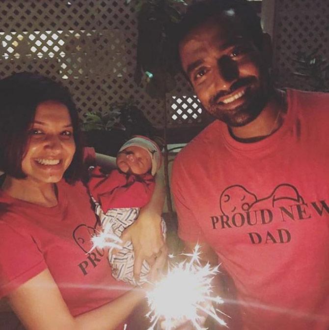 Robin Uthappa: Neale's first Diwali and the lil champ slept thru it like the baby he is!! hope all of you had a peaceful safe and joyous Diwali!! #fam #batmenandjoker #lovehasconquered