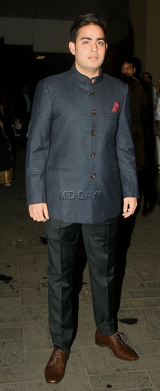 Akash Ambani wore a black suit at Zaheer Khan and Sagarika Ghatge`s party Akash Ambani wore a black suit at Zaheer Khan and Sagarika Ghatge`s party
