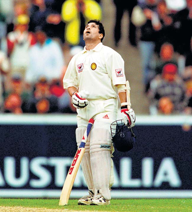 December 28, 1999: Sachin Tendulkar of India looks to the heavens after completing his century, on day three of the second test match between Australia and India, played at the Melbourne Cricket Ground, Melbourne, Australia. India finished the day at nine for 235 runs. Mandatory Credit: Hamish Blair/ALLSPORT