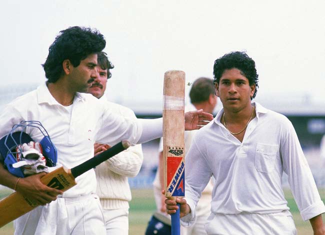 1990: Sachin Tendulkar is congratulated by Manoj Prabhakar after the young star scored his maiden Test hundred against England in the Old Trafford Test. PIC: GETTY IMAGES