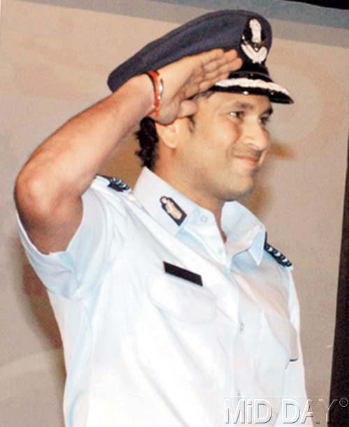 Aye, Aye captain: After being conferred with the Indian Air Force's honorary rank of Group Captain in 2010. Pic/MiD DAY Archives