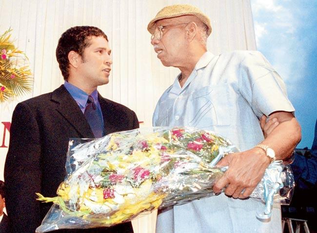 Homage to his guru: Sachin Tendulkar giving a floral tribute to Ramakant Achrekar at a felicitation function organised by Mumbai Cricket Association at Wankhede Stadium, Mumbai, in 2001