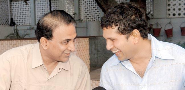Sharing smiles: Sunil Gavaskar and Sachin Tendulkar exchange a light moment at the Cricket Club of India, Mumbai, during the release of the book Cricket at Fever Pitch, in 2006