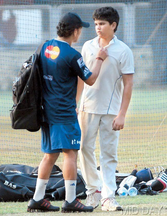 The master and the little master: Sachin Tendulkar at the nets with his son Arjun at MIG Club, Bandra, Mumbai, in 2012. Pic/Satyajit Desai