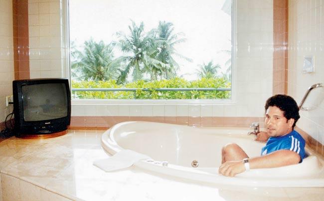 Making a splash: Sachin Tendulkar is as much at ease striking a pose, as he is notching up centuries