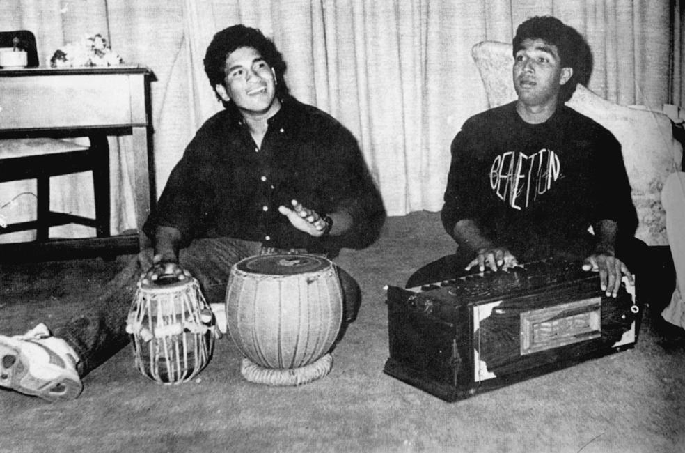 Two Harmonious: Tendulkar (left) plays the tabla while his Mumbai teammate Sanjay Manjrekar tries his hand at the harmonium in a team hotel. The Mumbai players were on the same tour of Pakistan in 1989-90.