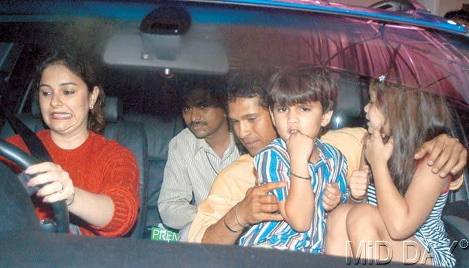 My treasures: Sachin Tendulkar with his family -- wife Anjali (left), son Arjun and daughter Sara after returning from the historic tour of Pakistan in 2004 when India won the Test and one-day series. Pic/MiD DAY Archives