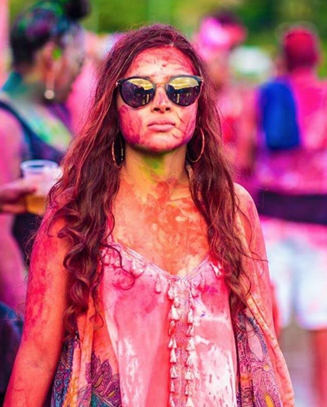 In picture: Sakshi Dhoni drenched in all colours during the festival of Holi.