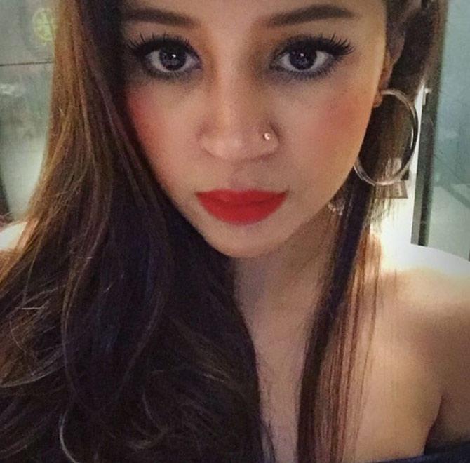 In picture: Sakshi Dhoni sports red lipstick and really looks radiant.