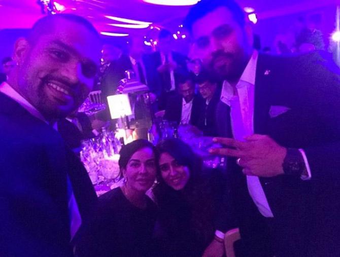 In picture: Shikhar Dhawan with Aesha, Rohit Sharma and his wife Ritika Sajdeh at Virat Kohli's charity fundraiser.