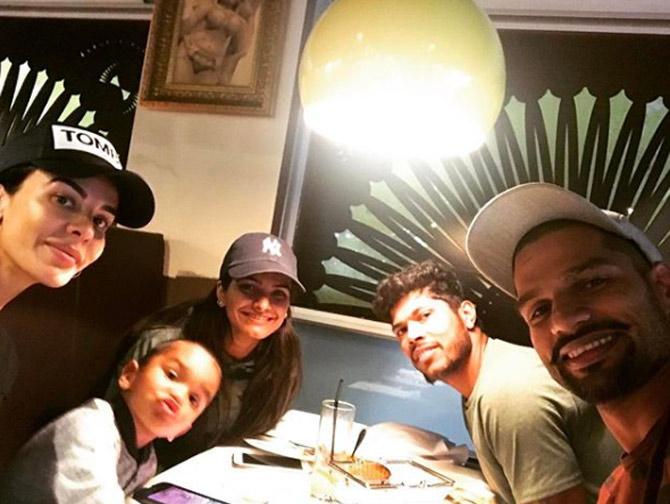 In picture: Shikhar Dhawan, wife Aesha and their son Zoravar at a dinner outing with Umesh Yadav and his wife Tanya Wadhwa.