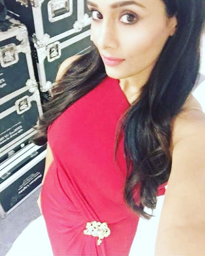 In picture: Mayanti Langer takes a selfie in a red dress during one of her sport events and looks absolutely stunning