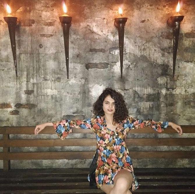 Tania Sachdev sports a flowery short dress and captioned this picture: Sit down and be humble. I'm halfway there and it's only January
