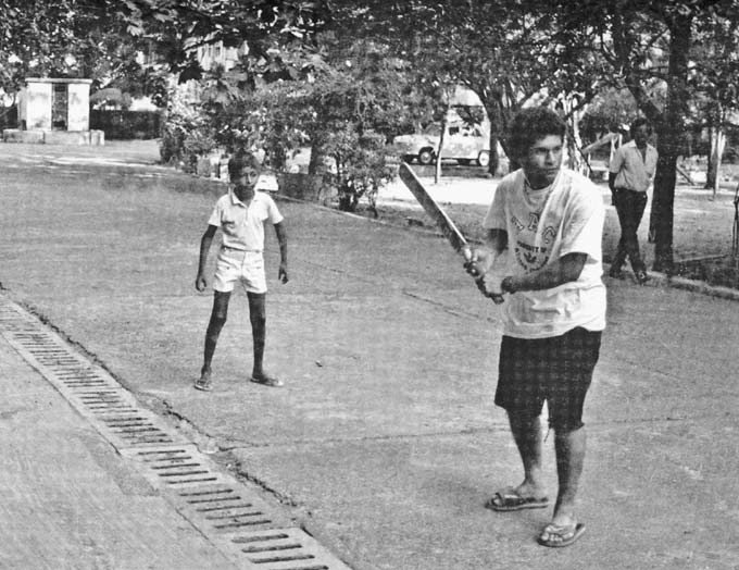 ANY PITCH WILL DO: Tendulkar surely can't get enough of cricket as he plays a few tennis-ball games in the Sahitya Sahawas society compound