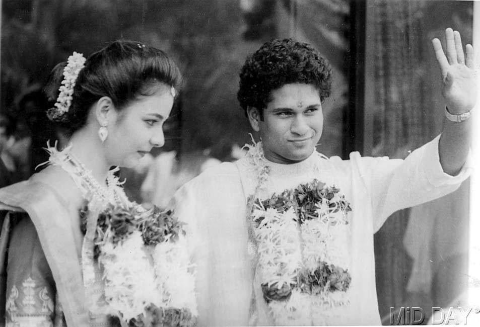 Sachin and Anjali Tendulkar wave to the paparazzi on their wedding day in May 1995