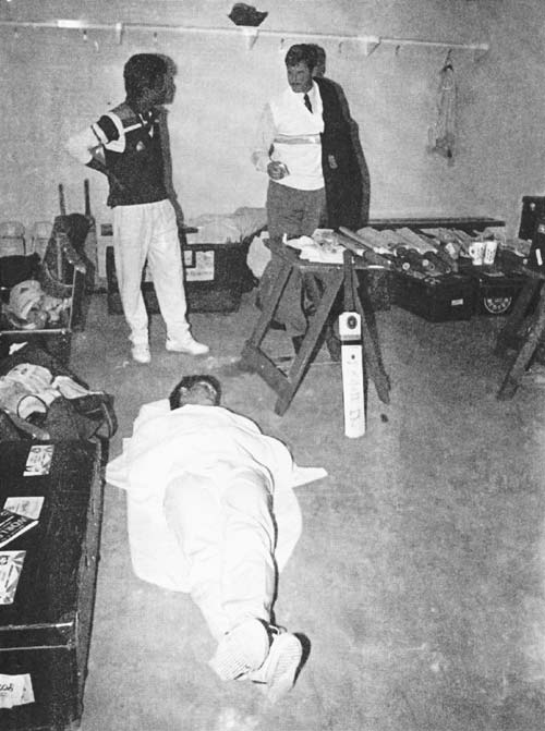 SLEEPING TIGER: Tendulkar takes a nap inside the dressing room while Kiwi great Richard Hadlee (right) paid a surprise visit during one of India's tours to New Zealand