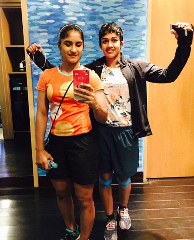 After winning the gold medal at Asian Games 2018, Vinesh Phogat, who also has a bronze from the last Asian Games in Incheon revealed, 'I said to myself before going into today's final that enough of these bronze and silver medals, it's high time I got a gold medal now. I'm glad to have lived up to my own expectations.' In picture: Vinesh Phogat and Babita Kumari.