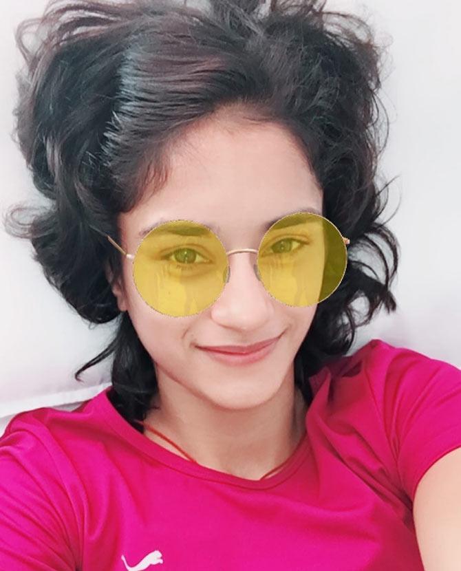 Vinesh Phogat sports cool yellow sunglasses. Speaking of her Asian Games 2018 final opponent Yuki Irie, Vinesh Phogat said, 'There was pressure but it was to prove that I am actually stronger than her. I wanted to prove this today because I lost thrice to her before. And I have done this today.' The 23-year old from Haryana is considered one of the most mentally strong wrestlers in India and she says it comes naturally to her  