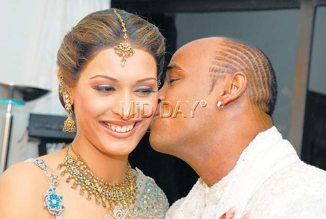 In picture: Vinod Kambli kisses his wife Andrea Hewitt on their big day