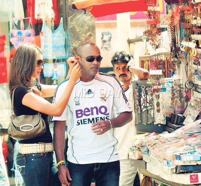 Pierce me, baby, one more time! Is that what Vinod Kambli is telling his wife Andrea Hewitt as she tries a new earring on him? This picture was taken when the then newlywed couple went shopping around at Link Road, Bandra