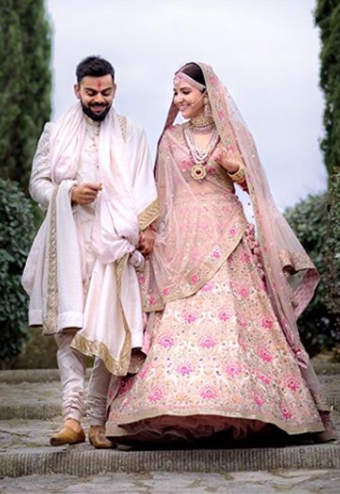 Virat Kohli and Anushka Sharma look adorable in this candid wedding photo (Picture/ Sabyasachi Mukherjee Instagram)
