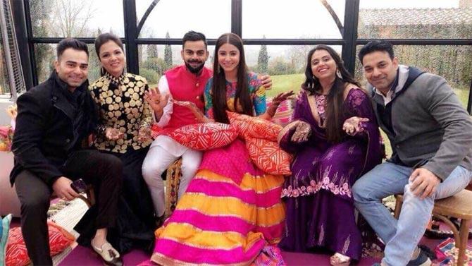 Virat Kohli and Anushka Sharma with some guests during the mehndi ceremony