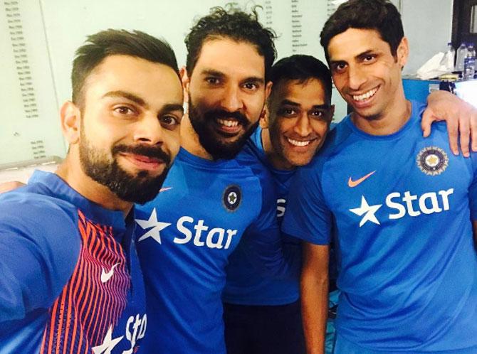 In picture: Virat Kohli with his buddies and former cricketers Yuvraj Singh, MS Dhoni and Ashish Nehra