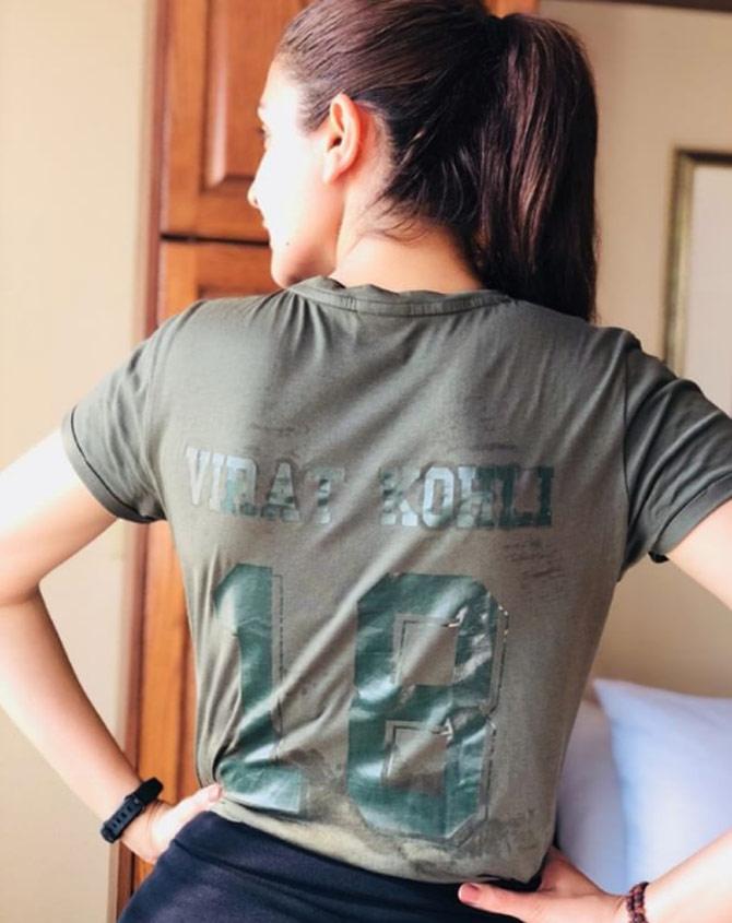 May 2018: IPL Royal Challengers Bangalore skipper Virat Kohli's wife Anushka Sharma tweeted this picture ahead of a T20 match against Punjab, wearing a tee with her husband's name and jersey number on the back. 'Come on boys,' she captioned it. Virat Kohli, whose team went on to dominate Punjab and win the game by 10 wickets to stay in contention for the playoffs, replied to her tweet saying: Yes, my love. Indeed we arrived today