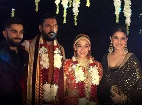 December 2016: Virat Kohli and Anushka Sharma played the perfect 'baraatis' at Yuvraj Singh and Hazel Keech's post-wedding party in Goa by enjoying themselves to the hilt. The newlyweds hosted an after-wedding party that saw the likes of Mukesh and Nita Ambani and many members of the Indian cricket team in attendance. But all eyes were on Virat Kohli and Anushka Sharma, the moment they entered. The duo didn't disappoint. They set the dance floor on fire with their moves along with Yuvraj and Hazel