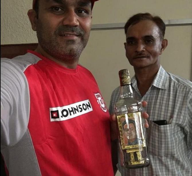 Virender Sehwag: 'Ek Virender Bottle ke Andar. Khud hi ko Pi jaao. #Kalakaari'. (One Virender is inside the bottle. Drink yourself)'