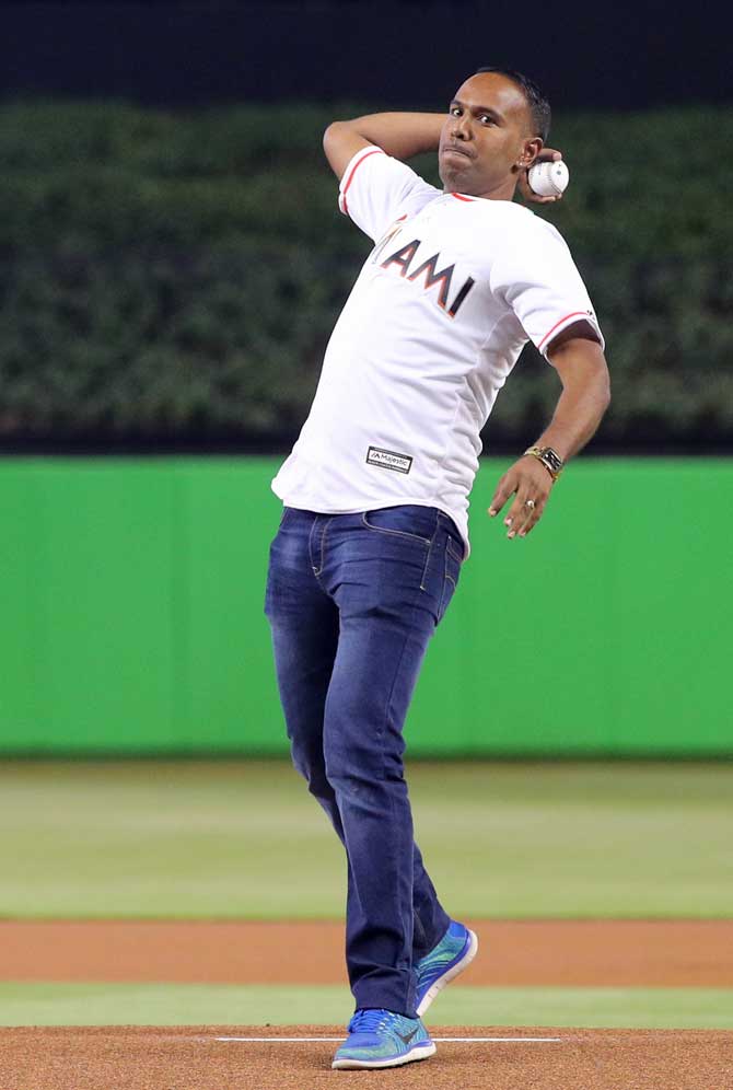 West Indies cricketer Samuel Badree throws out the first pitch before the game between the Miami Marlins and the Atlanta Braves at Marlins Park on Thursday in Miami, Florida. Pic/AFP