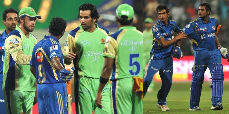 Mumbai Indians batsman Ambati Rayadu (3R) confronts Royal Challengers Bangalore's Zaheer Khan (2R) even as AB de Villiers (2L) looks on during a match at the M. Chinnaswamy Stadium in Bangalore on May 14, 2012. Pic/ AFP