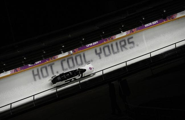We Luge It: Czech Republic-1 four-man bobsleigh, pilot Jan Vrba, pushman Dominik Suchy, pushman Dominik Dvorak and brakeman Michal Vacek compete in the Bobsleigh Four-man Heat 2 (AFP)
