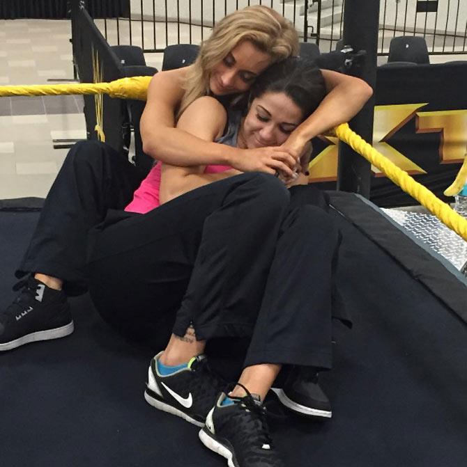 In picture: Bayley and Carmella take a nap