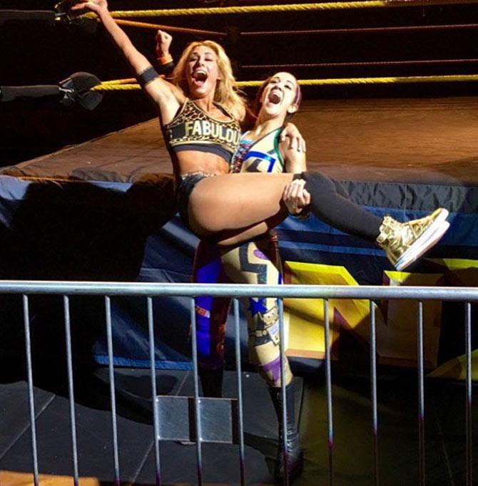 Bayley has won the  Raw women's championship once and the SmackDown women's championship twice. She is also a former NXT women's champion In picture: Bayley having some fun time with WWE's Carmella