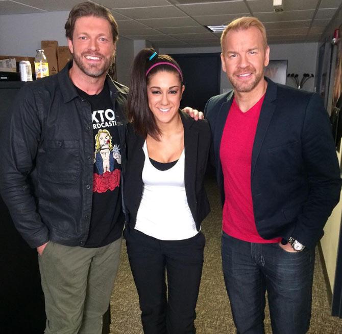In picture: Bayley with WWE legends Edge and Christian