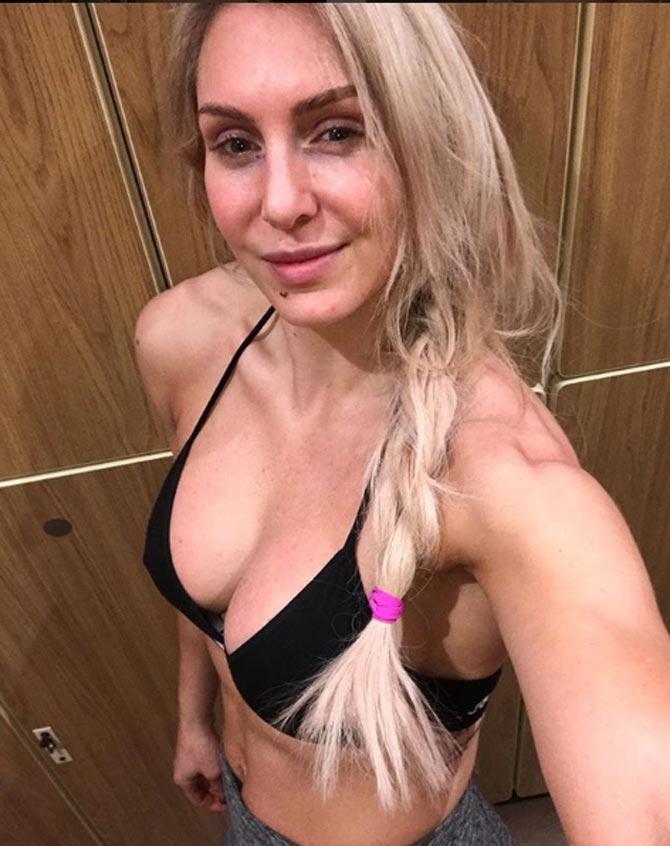 Charlotte Flair shared this photo with the caption: my NEW @mybirdiebee bra! Thank you @thenikkibella @thebriebella feeling sexy even at the gym Diet: @jasonphillips_in3 helping me get my abs back (no more Ben and Jerry's for awhile)
