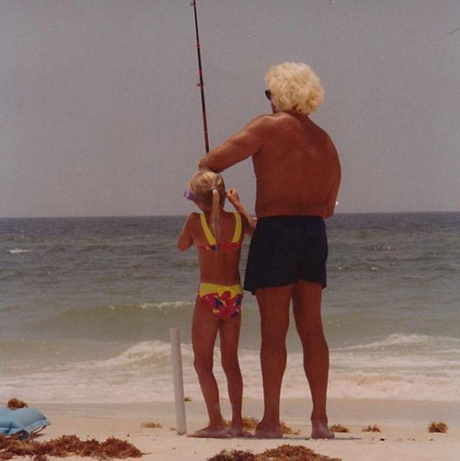 In picture: Charlotte Flair, during her younger days, with her father Ric Flair 