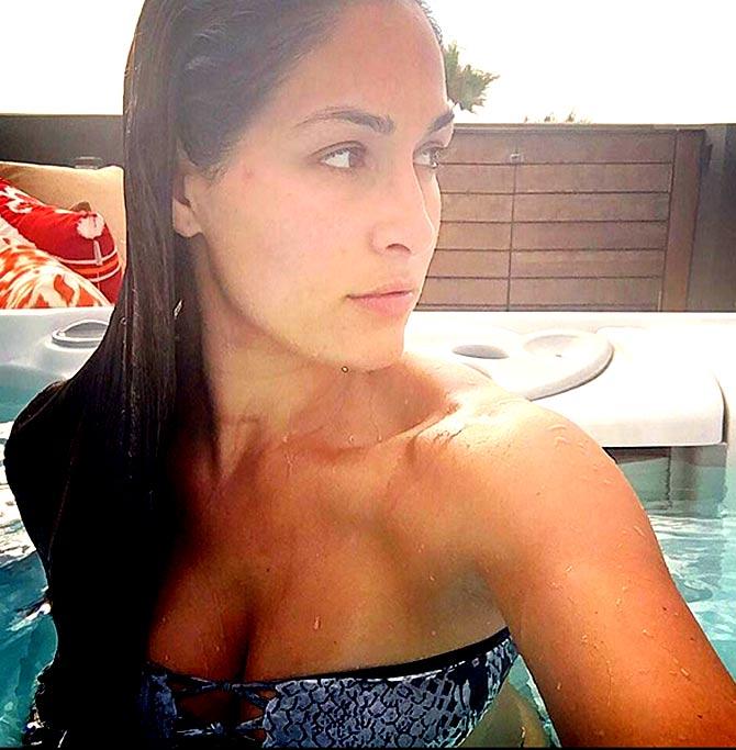 Nikki Bella caught in a candid picture in a swimming pool.