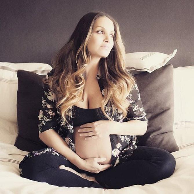 Trish Stratus: Trish Stratus: Can't believe I'm in the homestretch guys! Just posted a q&a about this pregnancy, cravings & my baby girls' name Click the link in bio to check it out! #39weeks #9months #anydaynow #cantwaittomeetyou #babygirl by the lovely @luveashlyn of @luveashlynphoto